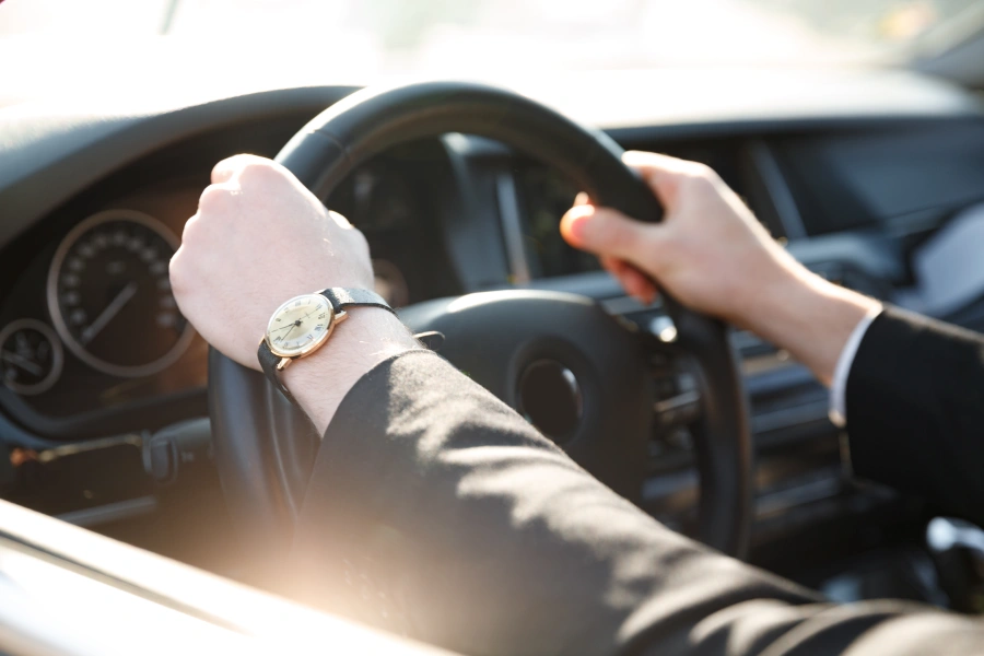 cropped-image-of-business-man-driving-car-2025-02-15-11-23-39-utc